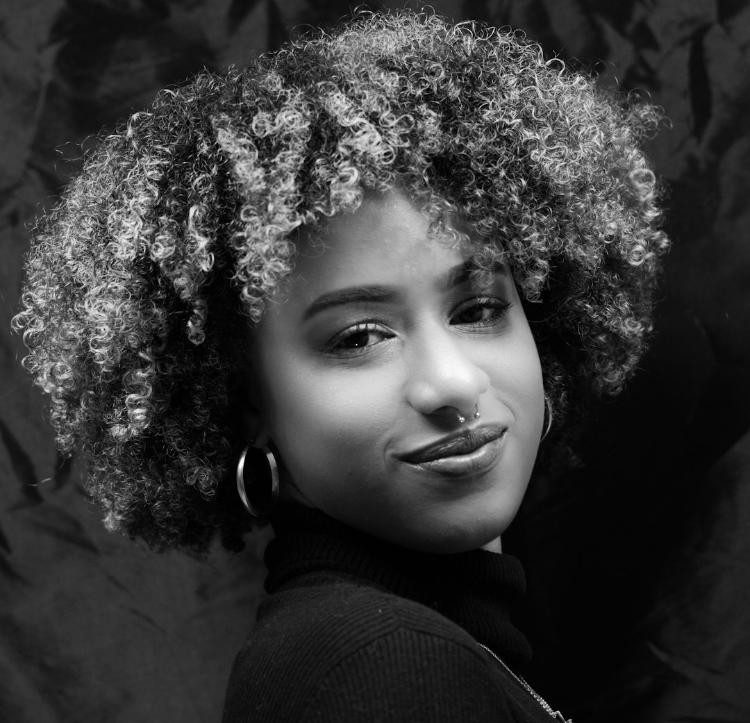 Portrait of a professional woman with curly hair
